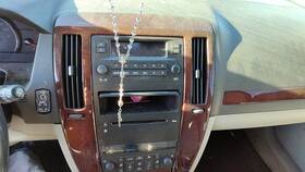 89045025 Cadillac 2005-2011 Sts Trim Bezel Around Radio Surround Dash Panel Oem