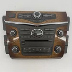 Infiniti QX56 Radio Navigation Ac Control Panel Wood 283951LA3A 253911LA5B 11-13. Fixed Price $100.00.