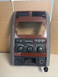 2004 Dodge Durango Center Radio A/c Climate Control Bezel Woodgrain 5HM58TRMADSS. Fixed Price $64.31.