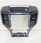 Genuine Mopar Bezel 5YU463X9AD. Fixed Price $125.00.