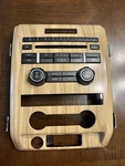 2011 Ford F150 Lariat Radio Control Panel Wood Grain. Part Number BL3T-18A802-HD. Fixed Price $40.00.