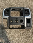 13-18 Dodge Ram Radio Climate Control Dash Bezel Trim Vent 115V Outlet. Fixed Price $123.00.