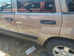 2005-2010 Jeep Grand Cherokee Driver Rear Door Oem Nvnqe. Fixed Price $525.00.