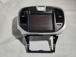 2011 - 2014 Chrysler 300 Center Dash Bezel With Screen (outter Trim Damaged). Fixed Price $165.00.