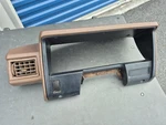 84-86 Toyota Pickup / 4RUNNER Instrument Gauge Cluster Surround & Vent Brown. Fixed Price $60.00.