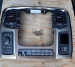 2013-2018 Dodge 1500 Laramie Floor Center Console Radio Bezel W/ Woodgrain. Fixed Price $439.00.