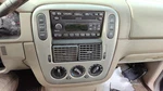 2004-2005 Ford Explorer Trim Bezel Around Radio Surround Dash Panel Oem. Fixed Price $95.00.