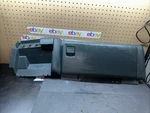 99-02 Chevy Gmc Sierra Silverado Graphite Glove Box With Surround (console). Fixed Price $125.00.