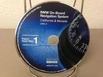 Genuine Oem Bmw On-board Navigation Disc Version 2005-2 Ca & Nv S0001-0111-502. Fixed Price $37.50.