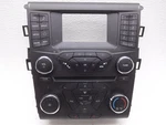 Oem Ford Fusion Audio Stereo Temp Control Face Plate Sirius Radio FS7T-18E243-KE. Fixed Price $75.00.