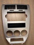 2007-09 Dodge Caliber Center Dash Radio Surround Bezel Climate Panel Silver. Fixed Price $79.99.