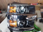 Passenger Headlight Chrome Bezel Fits 15-19 Silverado 2500 Pickup 1015991. Fixed Price $424.99.