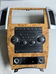 P55111930AA Jeep Grand Cherokee Climate Control Bezel. Fixed Price $120.00.